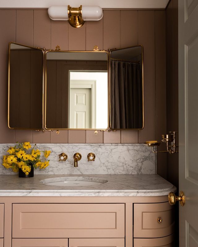 peach bathroom with French Tryptic Barber Mirror