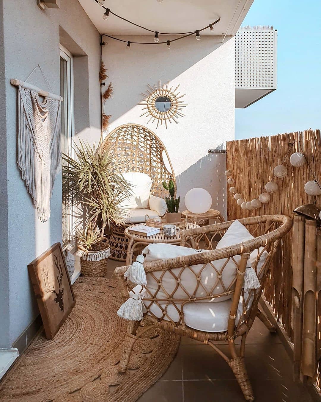 small boho balcony with rattan furniture